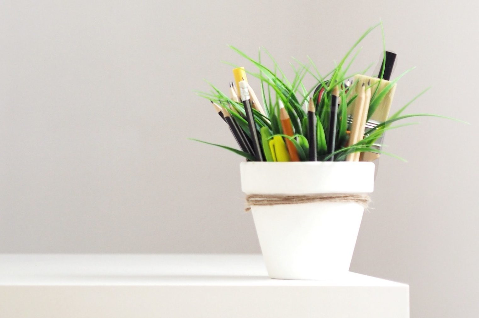 White desk with yellow mug